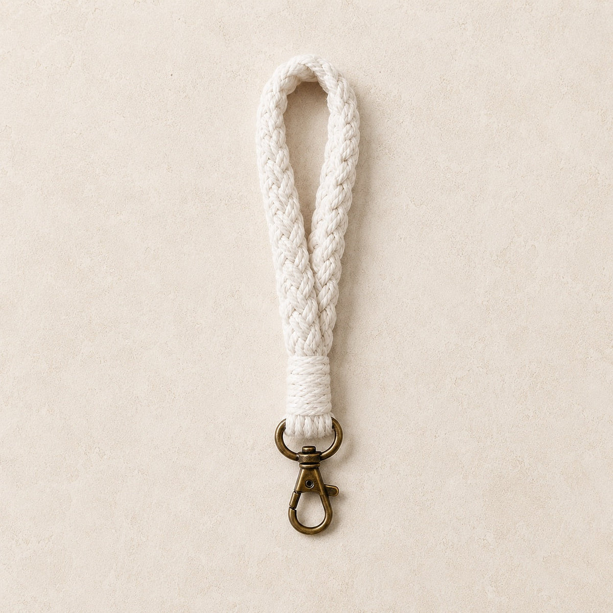 Asa de muñeca para clutch – Trenzada