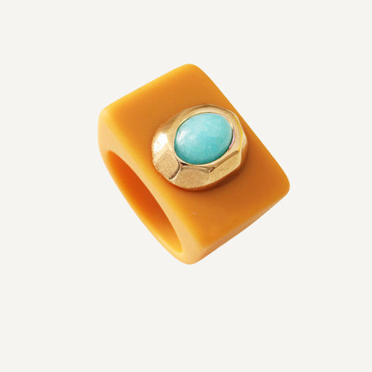 Anillo grande color mostaza turquesa
