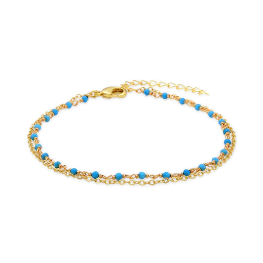 Tobillera acabado en oro amarillo de 18K